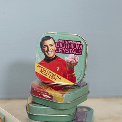 Tin of pink peppermint Dilithium Crystals candy.