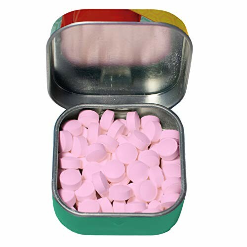 Open tin box filled with pink tablets